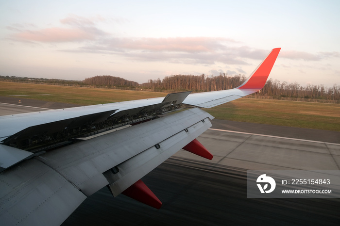 AIRPLANE LANDING WITH BRAKES ON AT ORLANDO FLORIDA INTERNATIONAL AIRPORT, USA