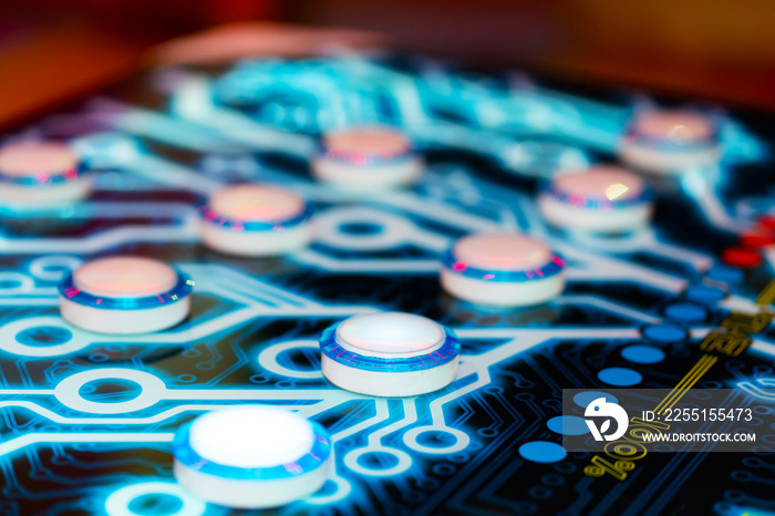 Close-up of an electronic arcade game. Board game button abstraction