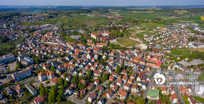 Aerial view of the city and monastery Bad Schussenried on a sunny day in Spring during the coronavirus lockdown.