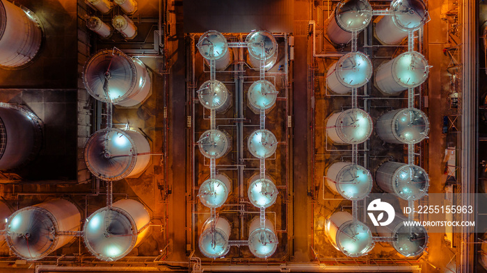 Storage tank of liquid chemical and petrochemical product tank, Aerial view at night.