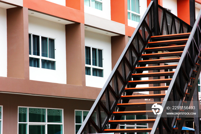 iron stair , wooden staircase with building background. geomatric shape pattern abstract background