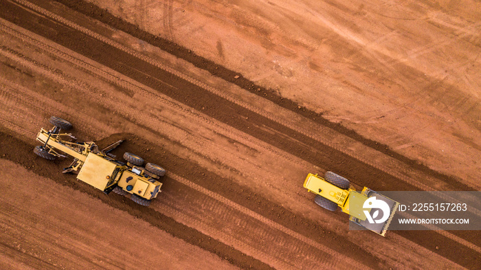 Aerial top view Tractor and Earthmoving at work.