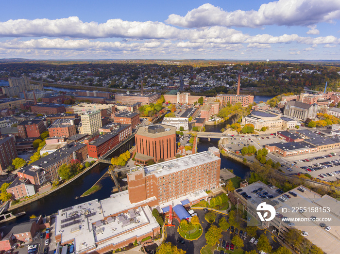 Lowell historic downtown, Canal, Marrimack River and historic Mills aerial view in fall in Lowell, Massachusetts, MA, USA.