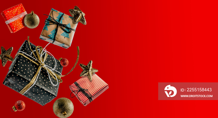 White Christmas gift boxes falling or flying in motion on red background.