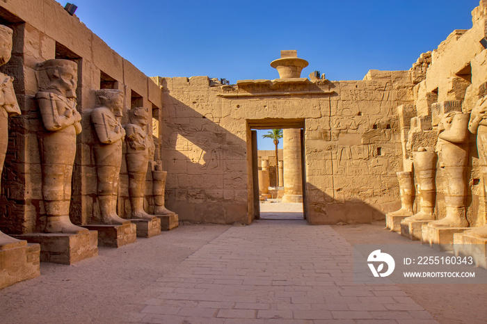 The pillars of Osiris in the courtyard of the Temple of Ramses III, Karnak, Egypt