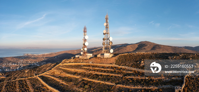 Cell tower. Cellular base station, mobile phone antenna aerial view. Rural island background