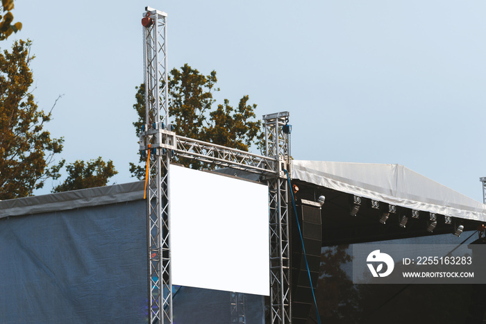 Photo of blank white screen at concert