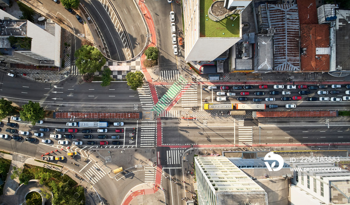 Sao Paulo, Brazil, top view of intersection between the Avenida Paulista and Consolacao street , crosswalk and cityscape.