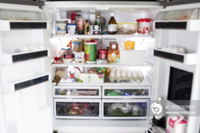 A fridge with food in blur