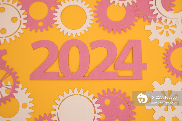 Year 2024 on the background of paper gears