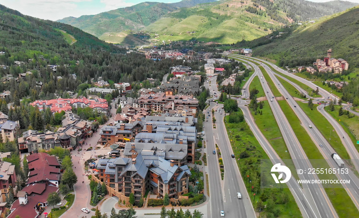 Vail city center and surrounding mountains, Colorado. Aerial view from drone in summer season