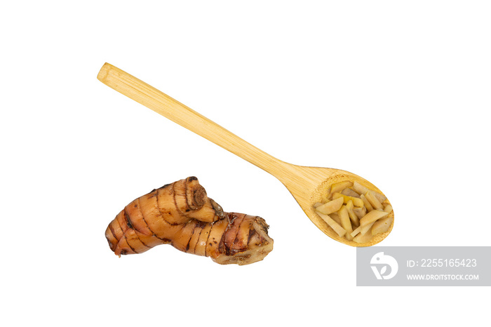 Galangal in a wooden spoon isolated