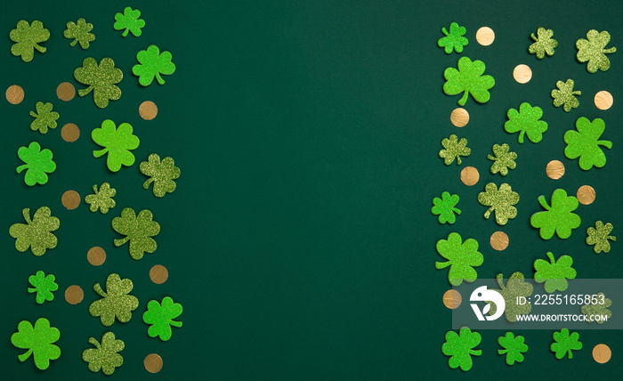 Golden Horseshoe, Gold Coins and Clover Leaves Shamrocks on Green Background.