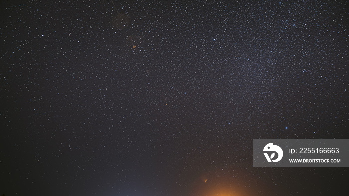 Real Colorful Night Sunset Sky Stars. Natural Starry Sky Background Backdrop. 4K, Time Lapse