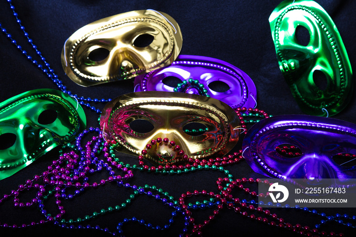 Mardi Gras Masks and Beads on Black