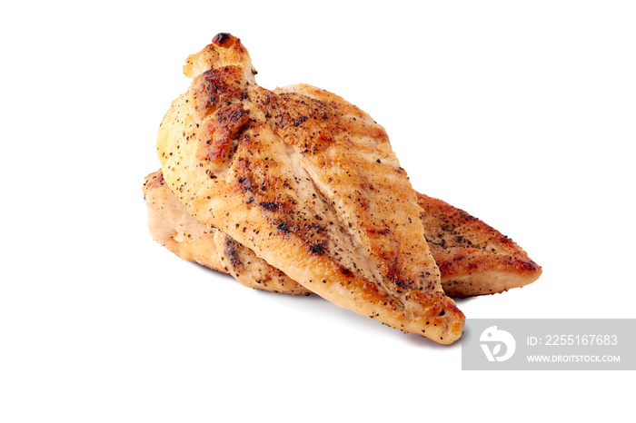 Roasted chicken breast fillets on white background