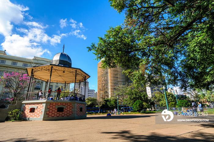 Bandstand at Liberty Square, Belo Horizonte, MG, Brazil on June 27, 2008. Urban scene on a sunny day with trees and buildings around.