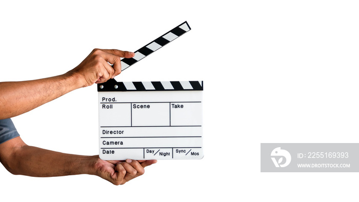 Hand holding a film clapboard slate or movie slate isolated on white background, with clipping path.