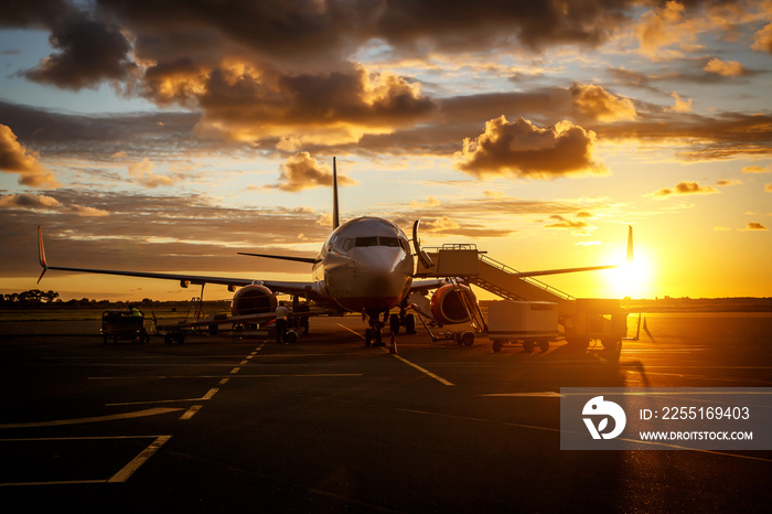 Commercial airplane in an airport before people boarding