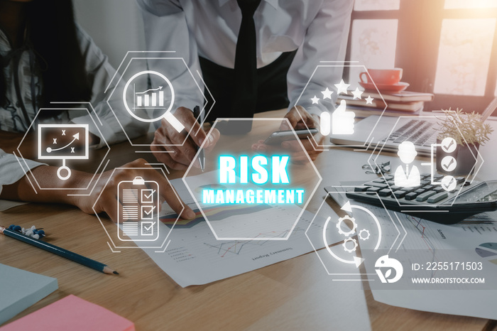 Risk management strategy plan finance investment internet business technology concept, Business team analyzing income charts and graphs with icons risk management on VR screen.