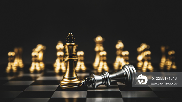 King golden chess standing of the falling silver on chess board concepts of leadership and business strategy management and leadership.