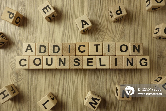 Text addiction counseling from wooden blocks