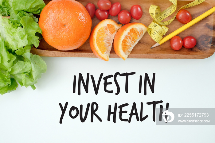 Invest in your health , Healthy lifestyle concept with diet and fitness , Get fit in  , fitness equipment and healthy food