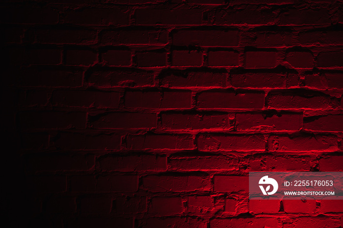 Horizontal background textured of brick wall with dark red neon lighting.