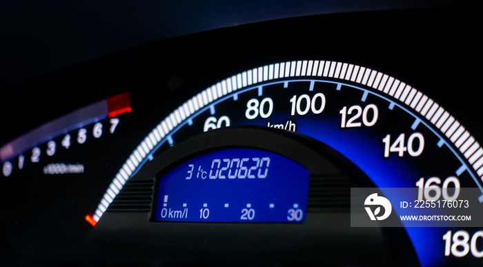 Blue car speed meter console dashboard panel