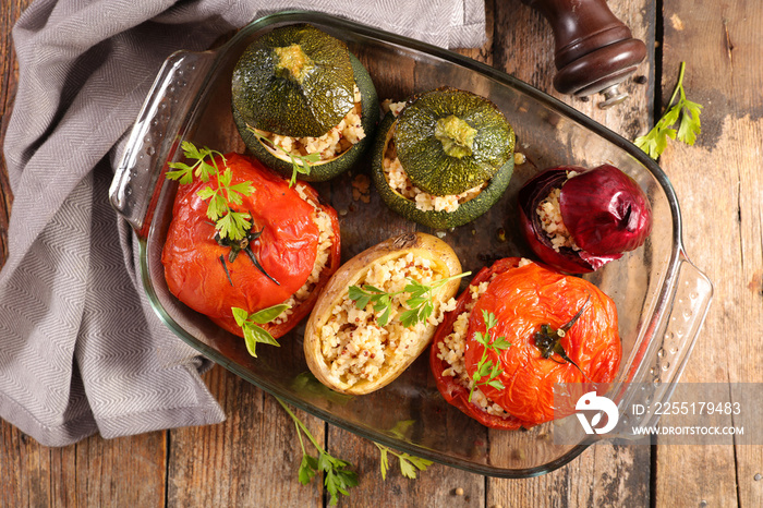 baked vegetable- tomato, zucchini and potato stuffed with cereal