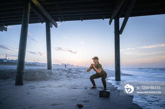 Marine veteran trains every morning on the beach to stay in shape just like when she was on active duty.