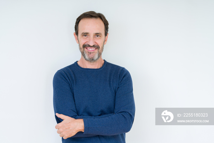 Elegant senior man over isolated background happy face smiling with crossed arms looking at the camera. Positive person.