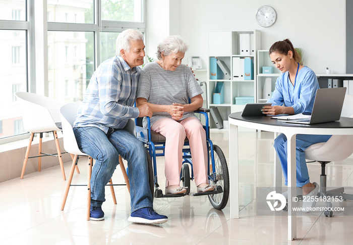 Elderly people with caregiver in nursing home