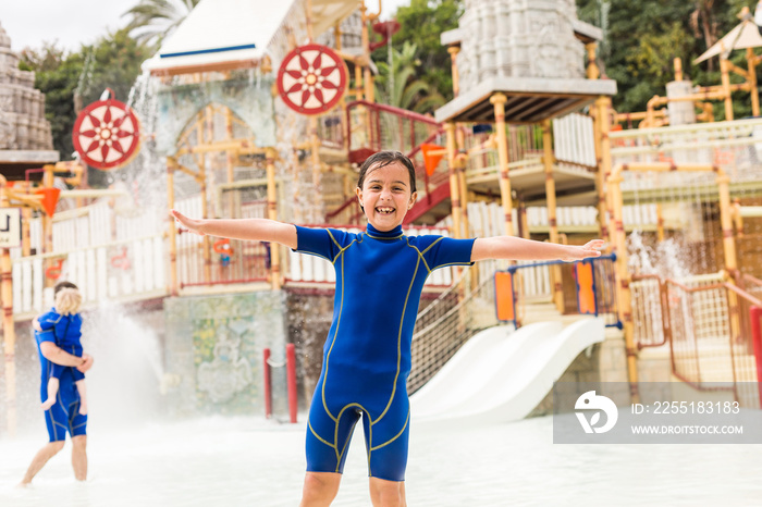 Parents with children in water park. Spain, Adeje.