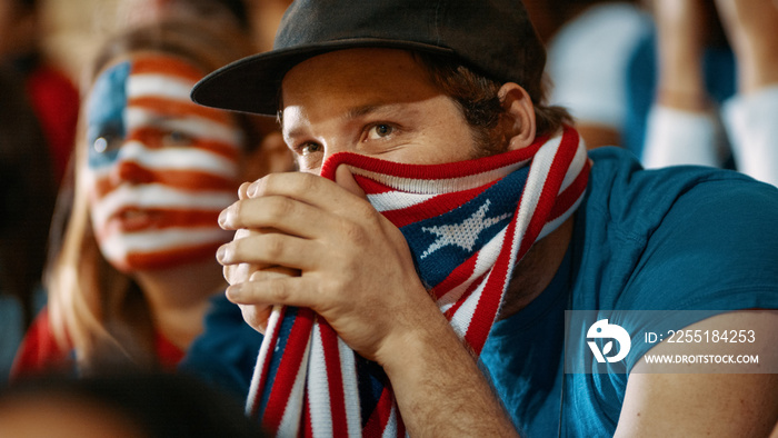 USA soccer fans watching the match closely at stadium