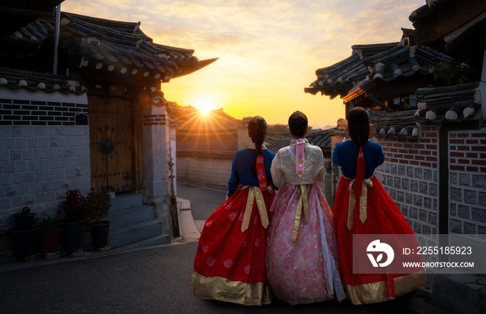 Korean girl in hanbok dress with morning at bukchon hanok village