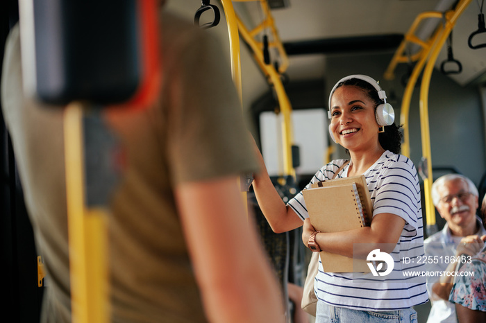 Female student traveling together in bus