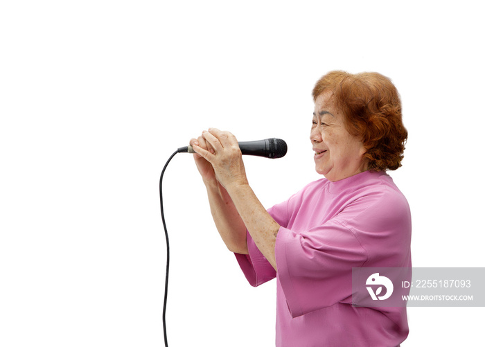 Grandma was happy to sing with a microphone. Isolated on white background