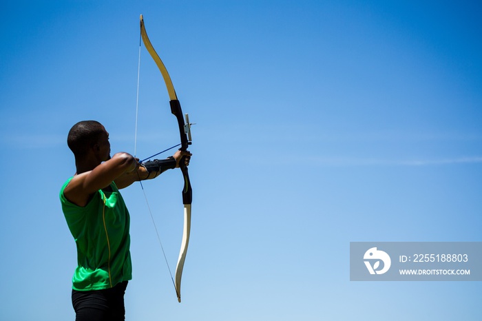 Athlete practicing archery