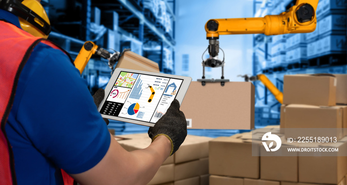 Smart robot arm systems for innovative warehouse and factory digital technology . Automation manufacturing robot controlled by industry engineering using IOT software connected to internet network .