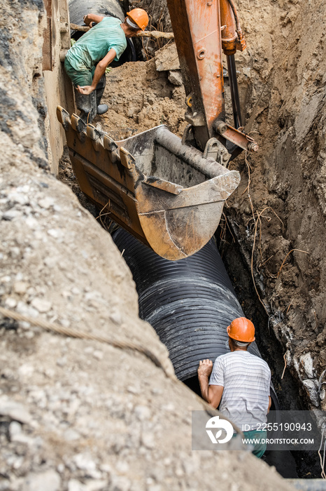 replacement of a sewer pipe deep under the ground