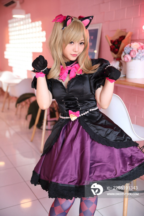 Japan anime cosplay , portrait of girl cosplay in pink room background