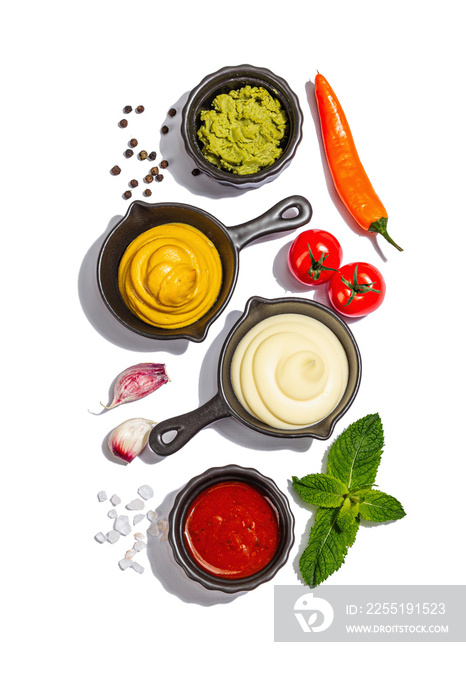 Set of sauces isolated on white background. Ketchup, mustard, mayonnaise, wasabi