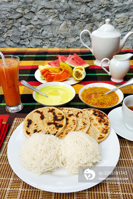 Breakfast at the hotel in Sri Lanka. Fresh fruits and pancakes