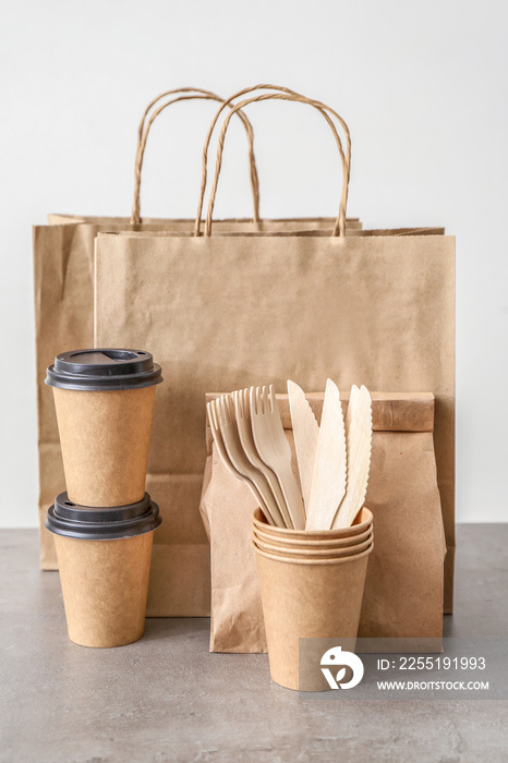 Assortment of food delivery containers on table