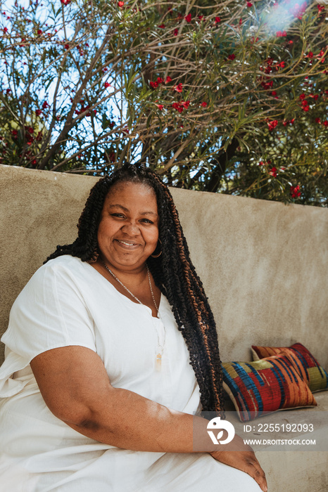 portrait of a plus size Afro Latinx Haitian american woman sitting down