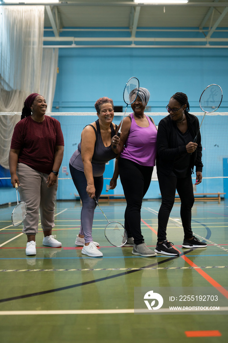 Portrait of women playing badminton