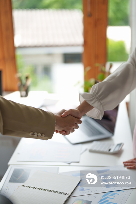 Close up of Business people shaking hands, finishing up meeting, business etiquette, congratulation, merger and acquisition concept