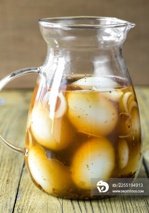 Pickled eggs in the glass jug