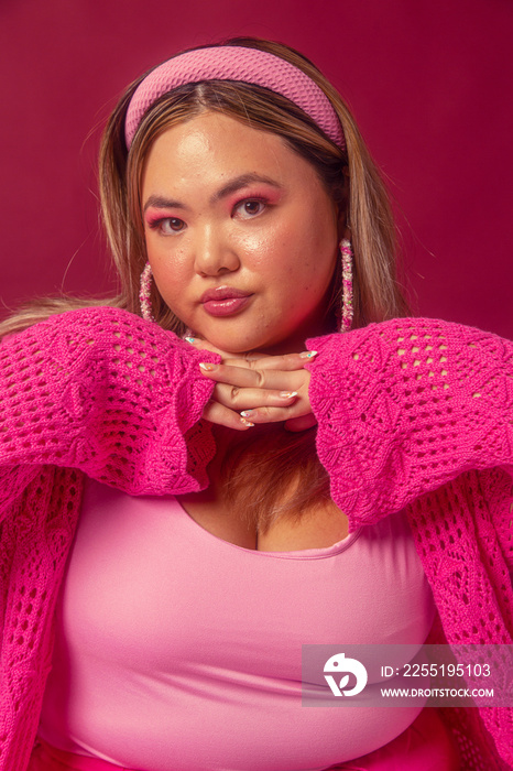 Asian individual fashion colour-blocked studio portrait